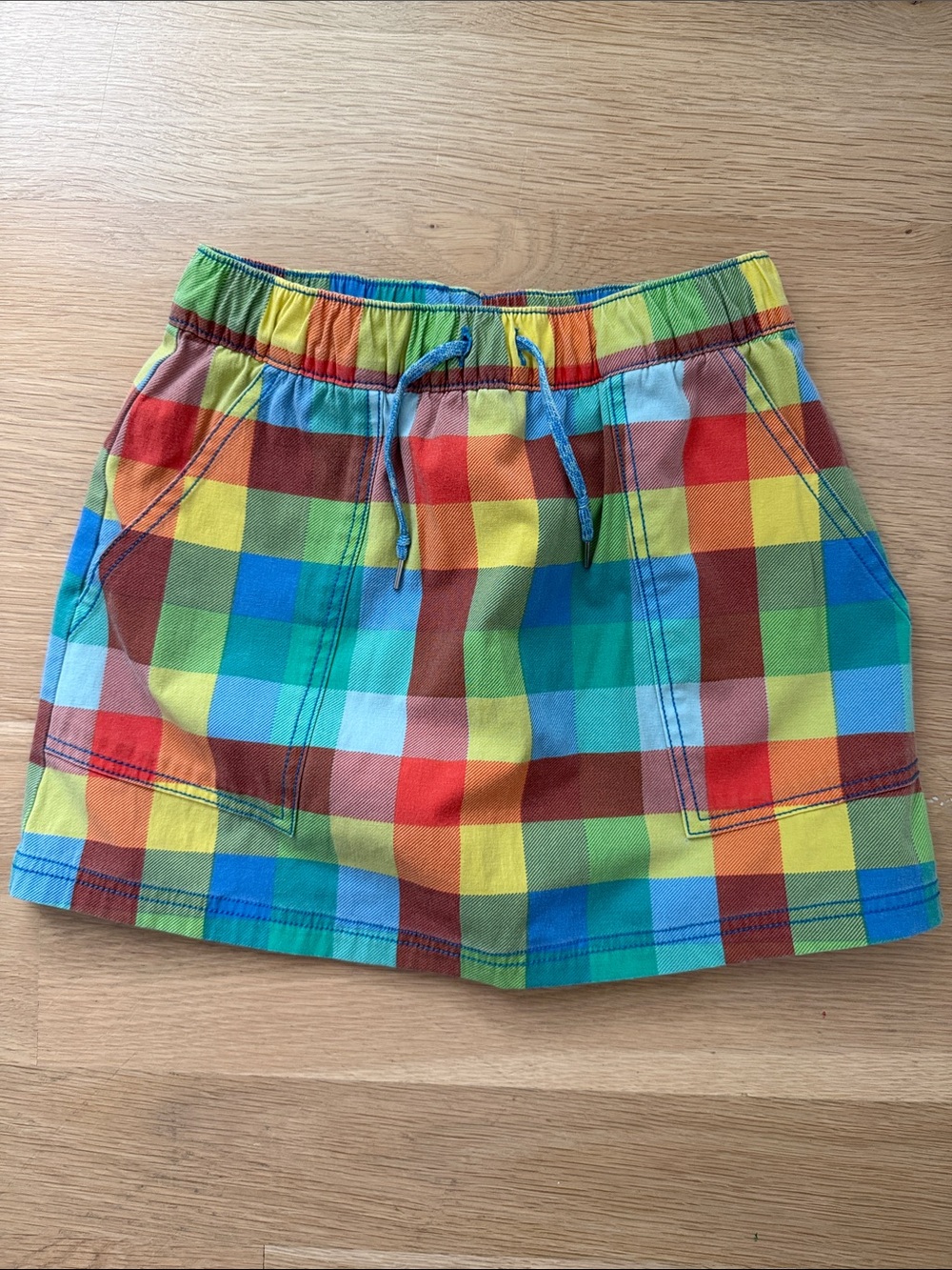 Hanna Andersson Rainbow Plaid Pull-On Skort in Red, Yellow, Green, Blue
